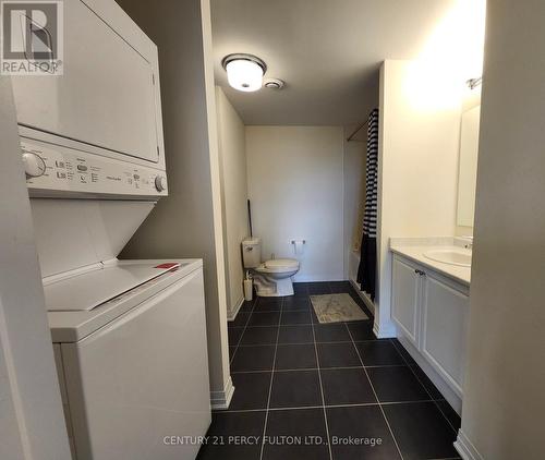 402 - 2 Adam Sellers Street, Markham (Cornell), ON - Indoor Photo Showing Laundry Room