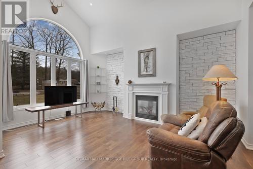 23 Christy Drive, Wasaga Beach, ON - Indoor Photo Showing Living Room With Fireplace