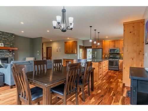 810 White Tail Drive, Rossland, BC - Indoor Photo Showing Dining Room With Fireplace