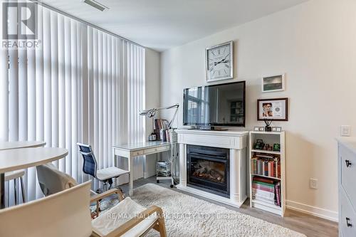 114 - 2300 St Clair Avenue W, Toronto (Junction Area), ON - Indoor Photo Showing Living Room With Fireplace