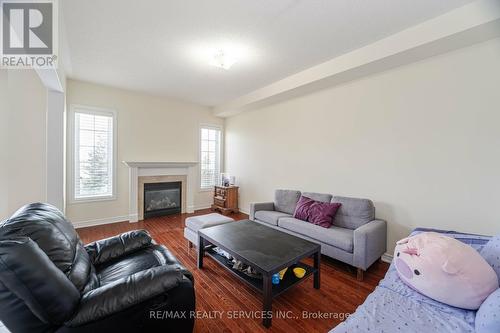 20 Vontress Street, Brampton, ON - Indoor Photo Showing Living Room With Fireplace