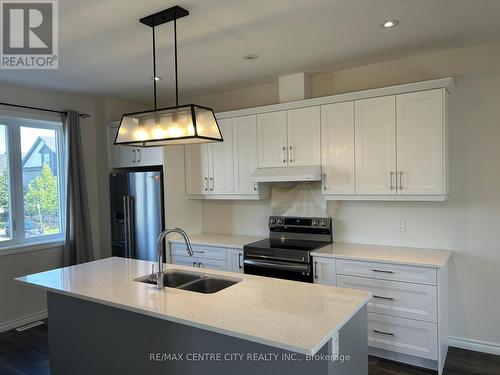 2561 Meadowland Way, London, ON - Indoor Photo Showing Kitchen With Double Sink