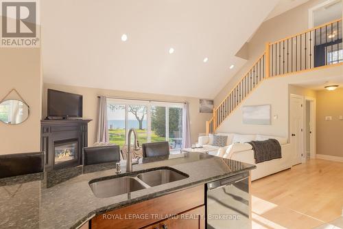 71888 Sunview Avenue, Bluewater (Hay Twp), ON - Indoor Photo Showing Kitchen With Fireplace With Double Sink