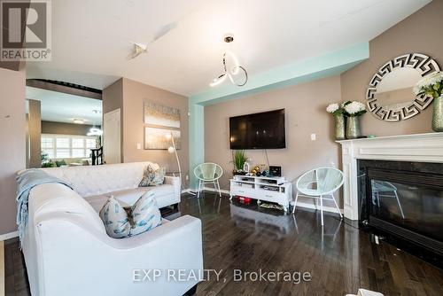 14 Decourcy-Ireland Circle, Ajax (Northeast Ajax), ON - Indoor Photo Showing Living Room With Fireplace