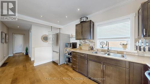 118 Phillip Avenue, Toronto (Birchcliffe-Cliffside), ON - Indoor Photo Showing Kitchen With Double Sink