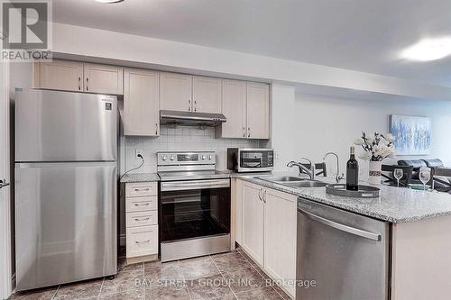 303 - 32 Clegg Road, Markham (Unionville), ON - Indoor Photo Showing Kitchen With Stainless Steel Kitchen With Double Sink