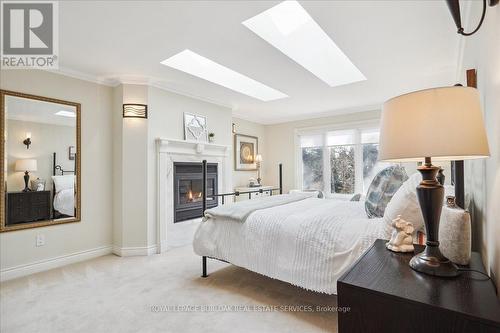 199 Penn Drive, Burlington, ON - Indoor Photo Showing Bedroom With Fireplace