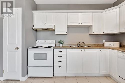 255 Keats Way Unit# 1206, Waterloo, ON - Indoor Photo Showing Kitchen With Double Sink