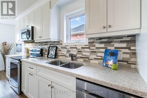 57 Bushford Street, Clarington (Courtice), ON - Indoor Photo Showing Kitchen With Double Sink