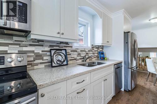 57 Bushford Street, Clarington (Courtice), ON - Indoor Photo Showing Kitchen With Double Sink