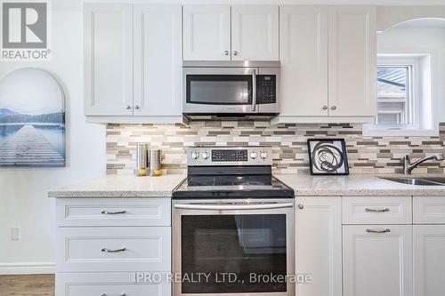 57 Bushford Street, Clarington (Courtice), ON - Indoor Photo Showing Kitchen With Double Sink