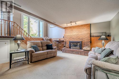 21 Doris Drive, Barrie, ON - Indoor Photo Showing Living Room With Fireplace