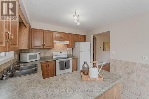 210 Rickson Avenue, Guelph (Hanlon Creek), ON - Indoor Photo Showing Kitchen With Double Sink