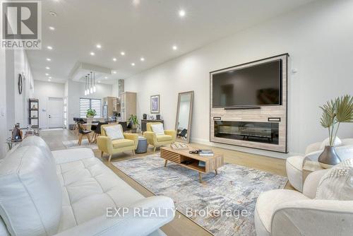 566 Lily Mac Boulevard, Windsor, ON - Indoor Photo Showing Living Room With Fireplace