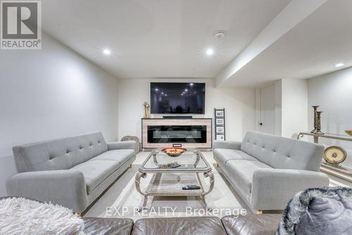 566 Lily Mac Boulevard, Windsor, ON - Indoor Photo Showing Living Room With Fireplace