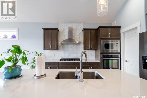 3656 Gee Crescent, Regina, SK - Indoor Photo Showing Kitchen With Double Sink With Upgraded Kitchen