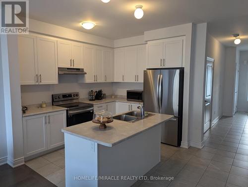 7 Lisa Street, Wasaga Beach, ON - Indoor Photo Showing Kitchen With Stainless Steel Kitchen With Double Sink