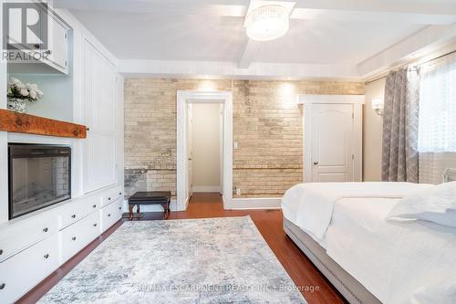 1 King William Street, Brant, ON - Indoor Photo Showing Bedroom With Fireplace