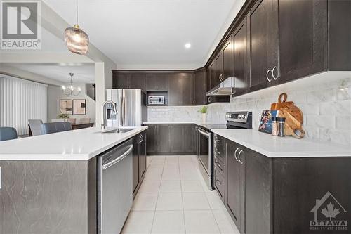 713 Samantha Eastop Avenue, Stittsville, ON - Indoor Photo Showing Kitchen With Stainless Steel Kitchen With Double Sink With Upgraded Kitchen