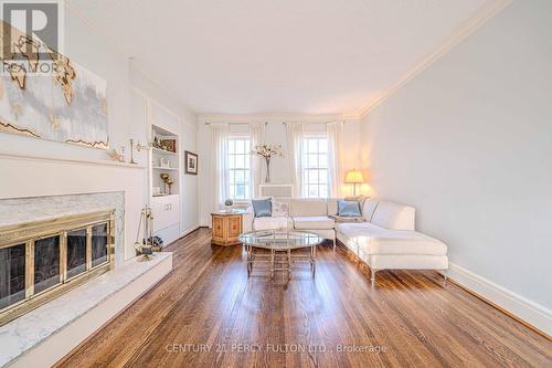 1 Parkcrest Drive, Toronto (Scarborough Village), ON - Indoor Photo Showing Living Room With Fireplace