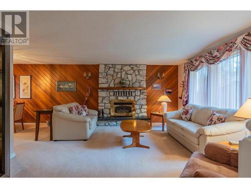 2504 14Th  Avenue, Castlegar, BC - Indoor Photo Showing Living Room With Fireplace