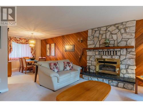 2504 14Th  Avenue, Castlegar, BC - Indoor Photo Showing Living Room With Fireplace