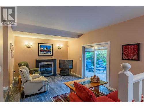 2504 14Th  Avenue, Castlegar, BC - Indoor Photo Showing Living Room With Fireplace