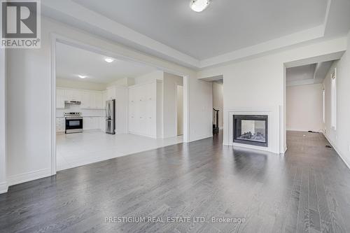 7 Malaspina Close, Brampton, ON - Indoor Photo Showing Living Room With Fireplace