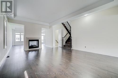 7 Malaspina Close, Brampton, ON - Indoor Photo Showing Living Room With Fireplace