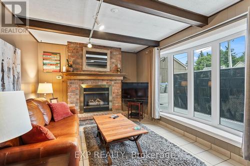 B - 11358 Longwoods Road, Middlesex Centre (Delaware Town), ON - Indoor Photo Showing Living Room With Fireplace