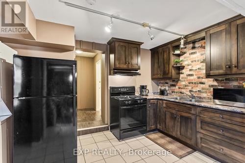 B - 11358 Longwoods Road, Middlesex Centre (Delaware Town), ON - Indoor Photo Showing Kitchen With Double Sink