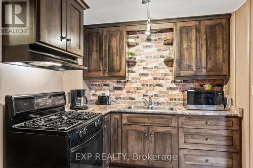 B - 11358 Longwoods Road, Middlesex Centre (Delaware Town), ON - Indoor Photo Showing Kitchen With Double Sink