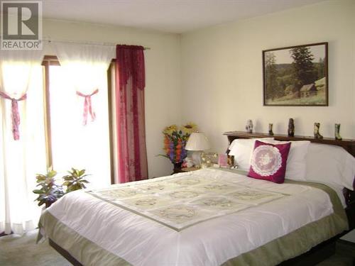 26 Barnes Road, Lumby, BC - Indoor Photo Showing Bedroom