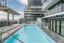 Th107 - 70 Annie Craig Drive, Toronto, ON  - Outdoor With In Ground Pool 