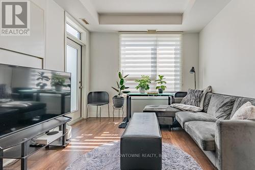 404 - 1105 Leger Way, Milton (Ford), ON - Indoor Photo Showing Living Room