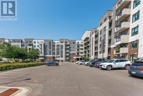 404 - 1105 Leger Way, Milton (Ford), ON - Outdoor With Facade