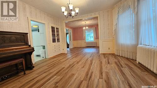 230 3Rd Avenue Nw, Swift Current, SK - Indoor Photo Showing Other Room With Fireplace