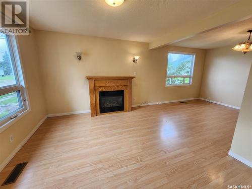 809 Garnet Street, Grenfell, SK - Indoor Photo Showing Living Room With Fireplace