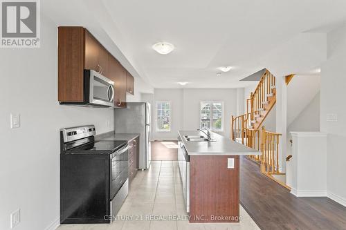 14 Village Gate Drive, Wasaga Beach, ON - Indoor Photo Showing Kitchen With Double Sink