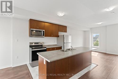 14 Village Gate Drive, Wasaga Beach, ON - Indoor Photo Showing Kitchen With Double Sink