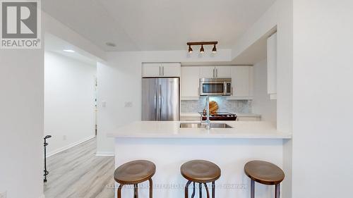 741 - 38 Grand Magazine Street, Toronto (Niagara), ON - Indoor Photo Showing Kitchen With Stainless Steel Kitchen With Upgraded Kitchen