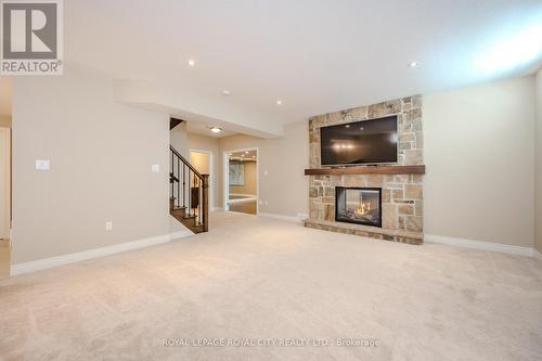 8 Paddison Court, Guelph, ON - Indoor Photo Showing Living Room With Fireplace