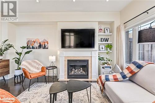 14 Montclair Mews, Collingwood, ON - Indoor Photo Showing Living Room With Fireplace