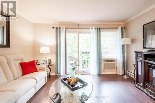 105 - 6 Niagara Street, Grimsby, ON - Indoor Photo Showing Living Room