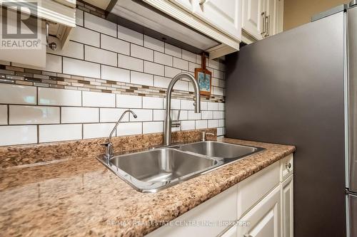 105 - 6 Niagara Street, Grimsby, ON - Indoor Photo Showing Kitchen With Double Sink