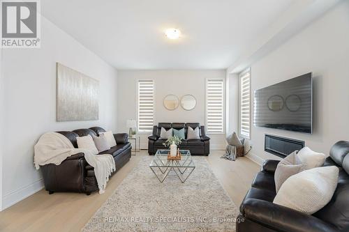 98 Raspberry Ridge Avenue, Caledon, ON - Indoor Photo Showing Living Room With Fireplace