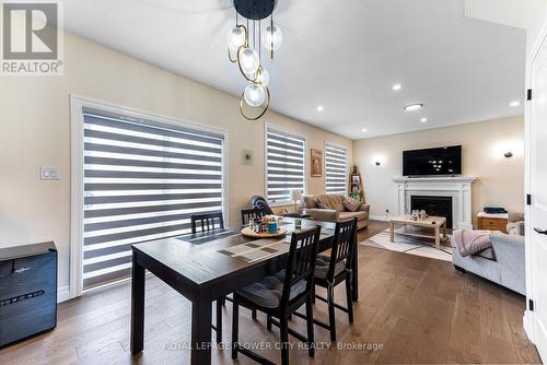 82 Optimist Drive, Southwold, ON - Indoor Photo Showing Other Room With Fireplace