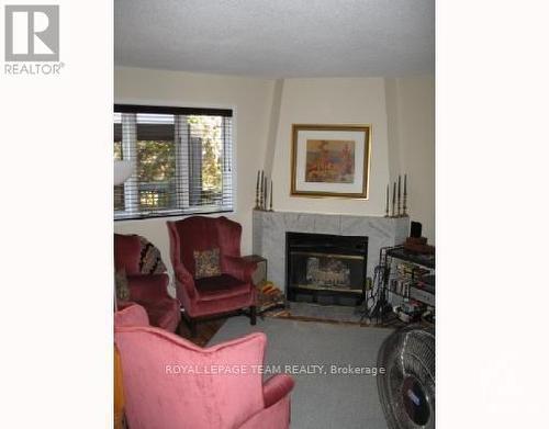 3466 Wyman Crescent, Ottawa, ON - Indoor Photo Showing Living Room With Fireplace