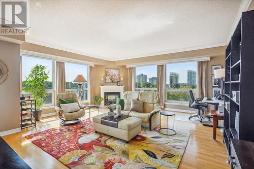 603 - 50 Old Mill Road, Oakville, ON - Indoor Photo Showing Living Room With Fireplace