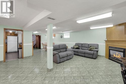 100 North Carson Street, Toronto (Alderwood), ON - Indoor Photo Showing Basement With Fireplace